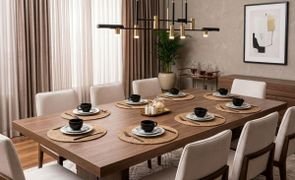 sala de jantar com mesa posta e lugares americanos